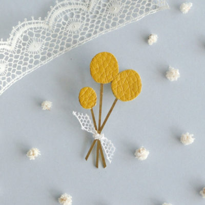 Bijou broche soleil