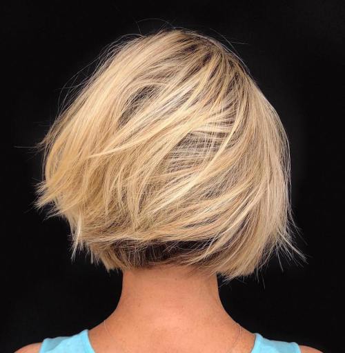 Dynamic Tousled Blonde Bob With Dark Underlayer