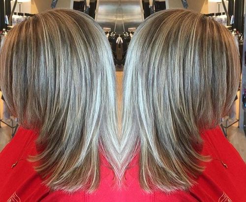 medium layered haircut with highlights