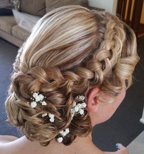 curly wedding updo with a dutch braid for long hair