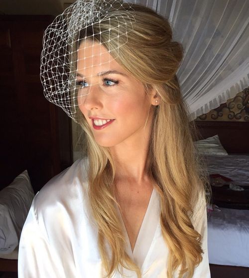 half up wedding hairstyle with birdcage veil