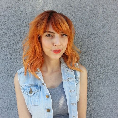 medium red shaggy hairstyle