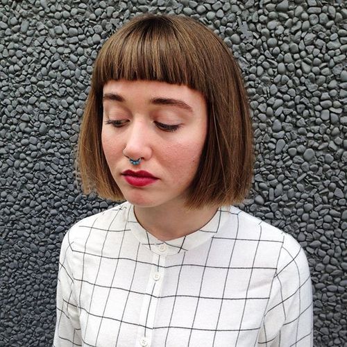 blunt chin-length bob with subtle highlights