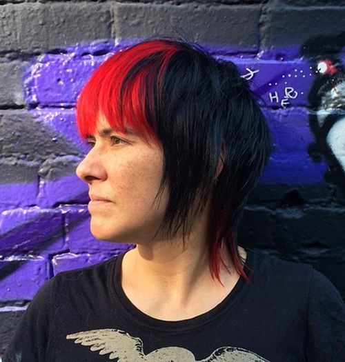 short black layered haircut with red bangs