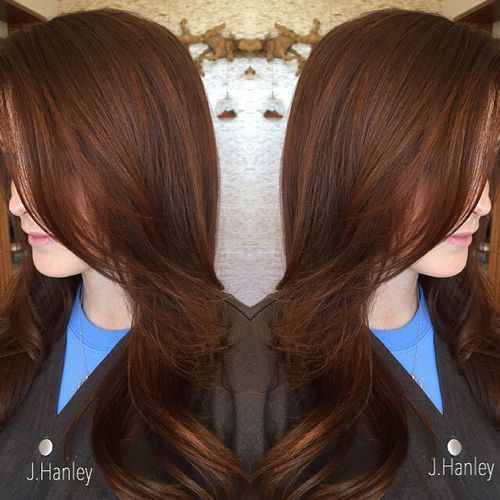 dark brown hair with subtle red highlights