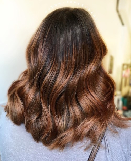 wavy auburn balayage hair