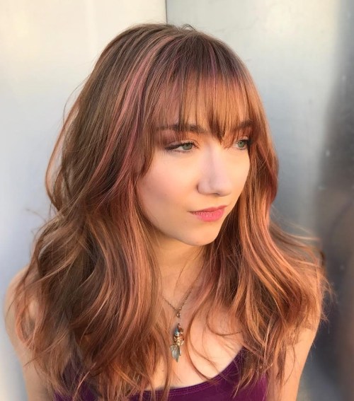 light red wavy hairstyle with bangs