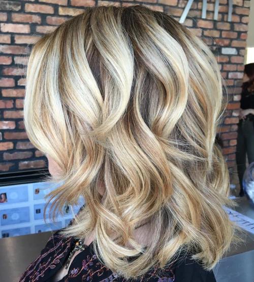 Medium Curly Blonde Hairstyle