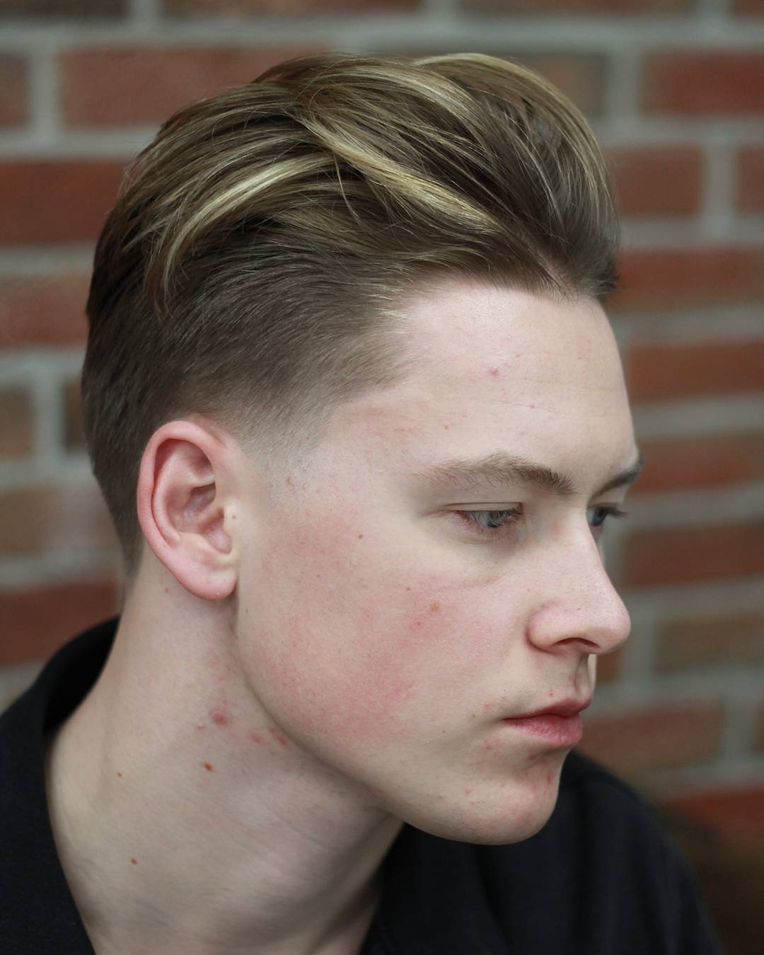 Modern slicked back men's hairstyle