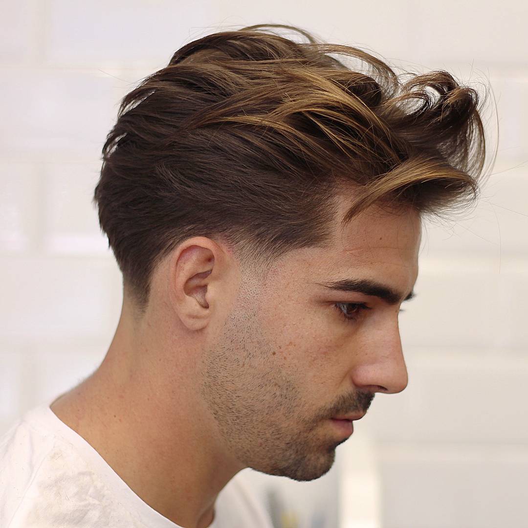 Medium length mens taper fade haircut 