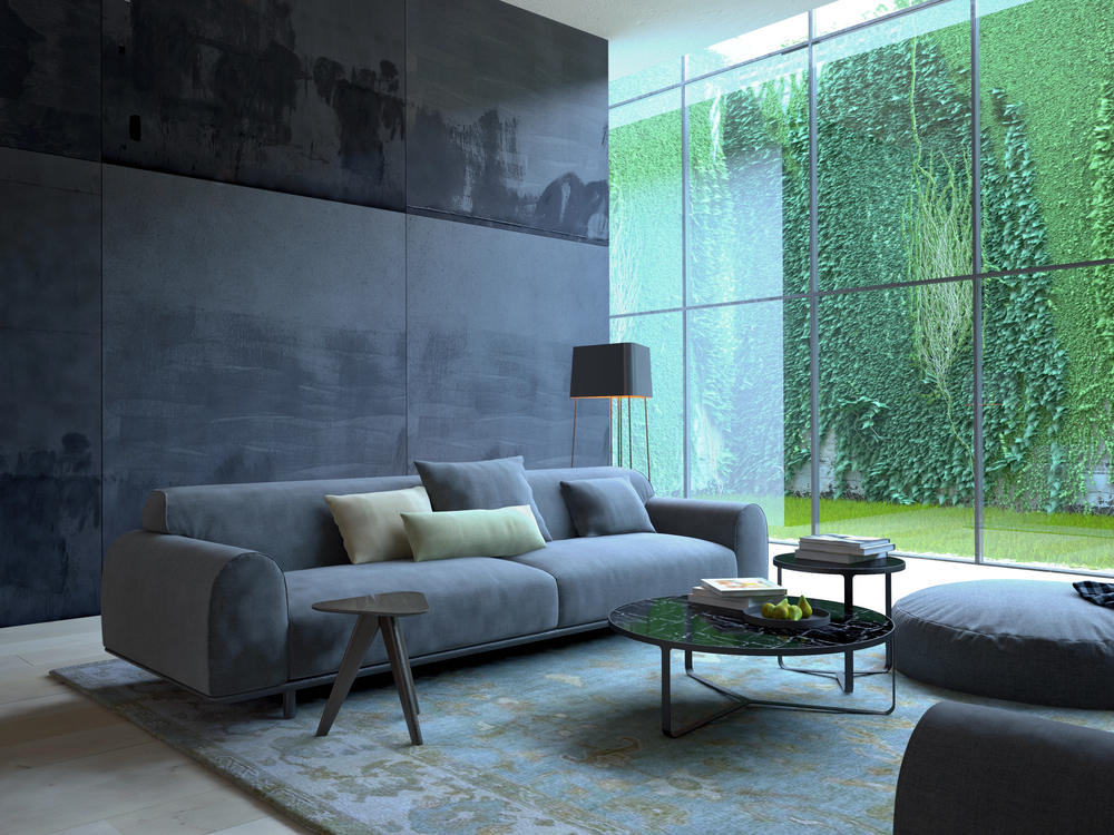 Salon moderne avec mur végétal, tapis confortable, canapé texturisé et lumière naturelle, décoration axée sur le calme et l'équilibre