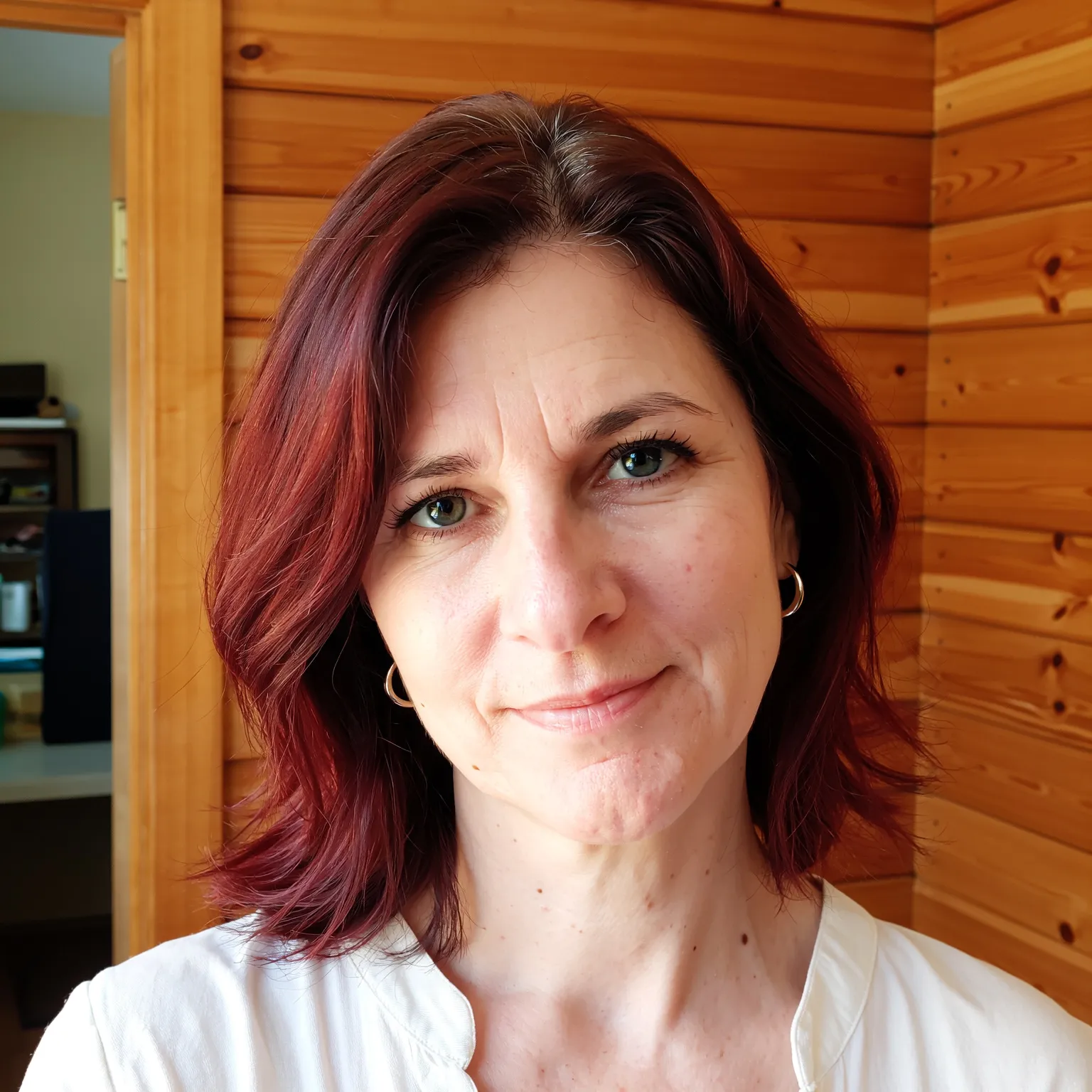 Carré flou cuivré pour femme de 58 ans, coupe lumineuse et pleine de mouvement pour illuminer le teint.