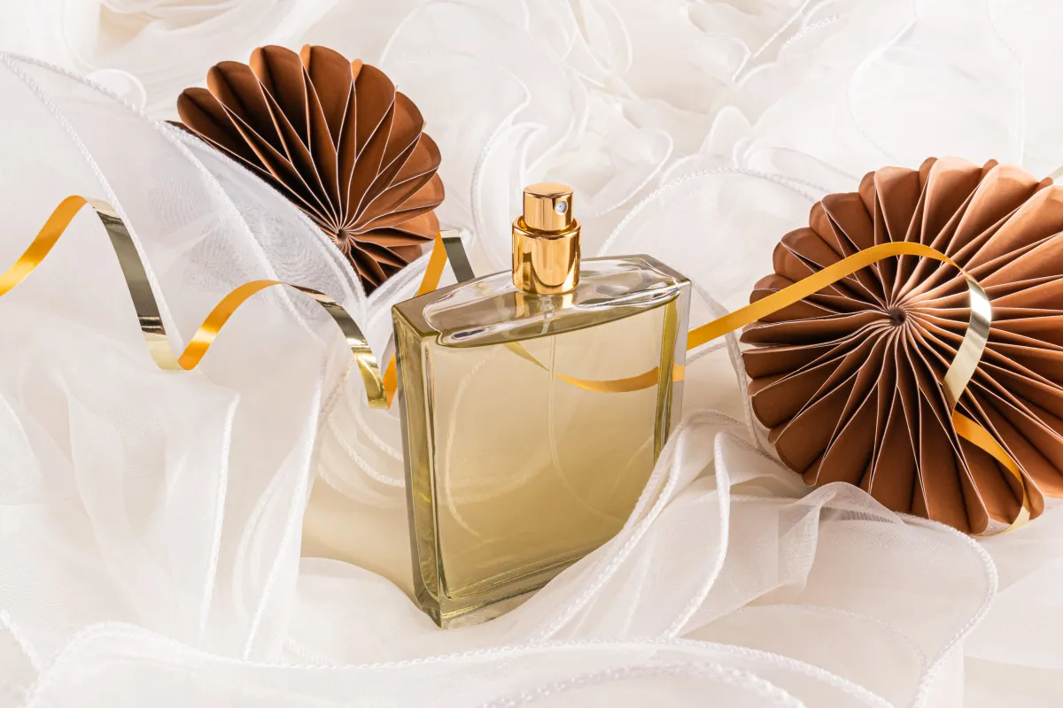 Elegant perfume bottle with brown and gold accents 2026 03 24 01 20 25 utc